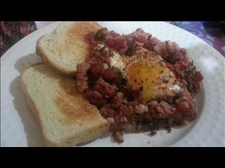 Moroccan Shakshuka with Corned Beef Hash and Toast.