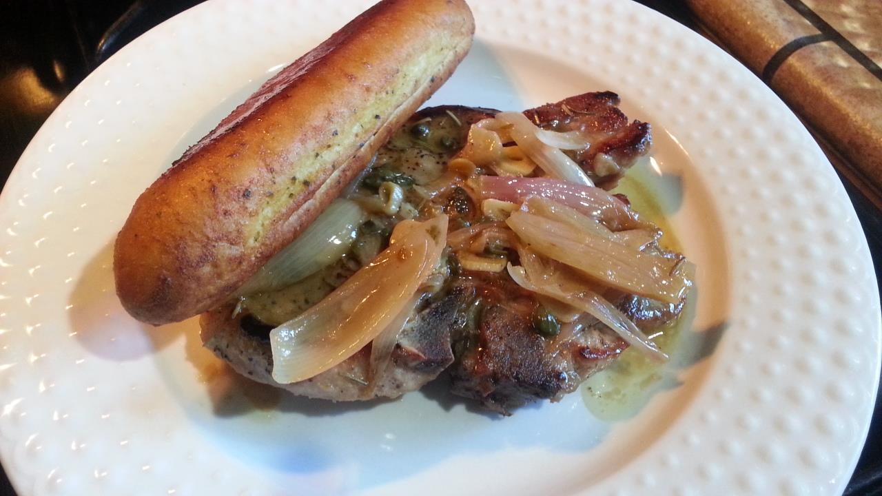 Capers and Scallions Pork Chop with Garlic bread.